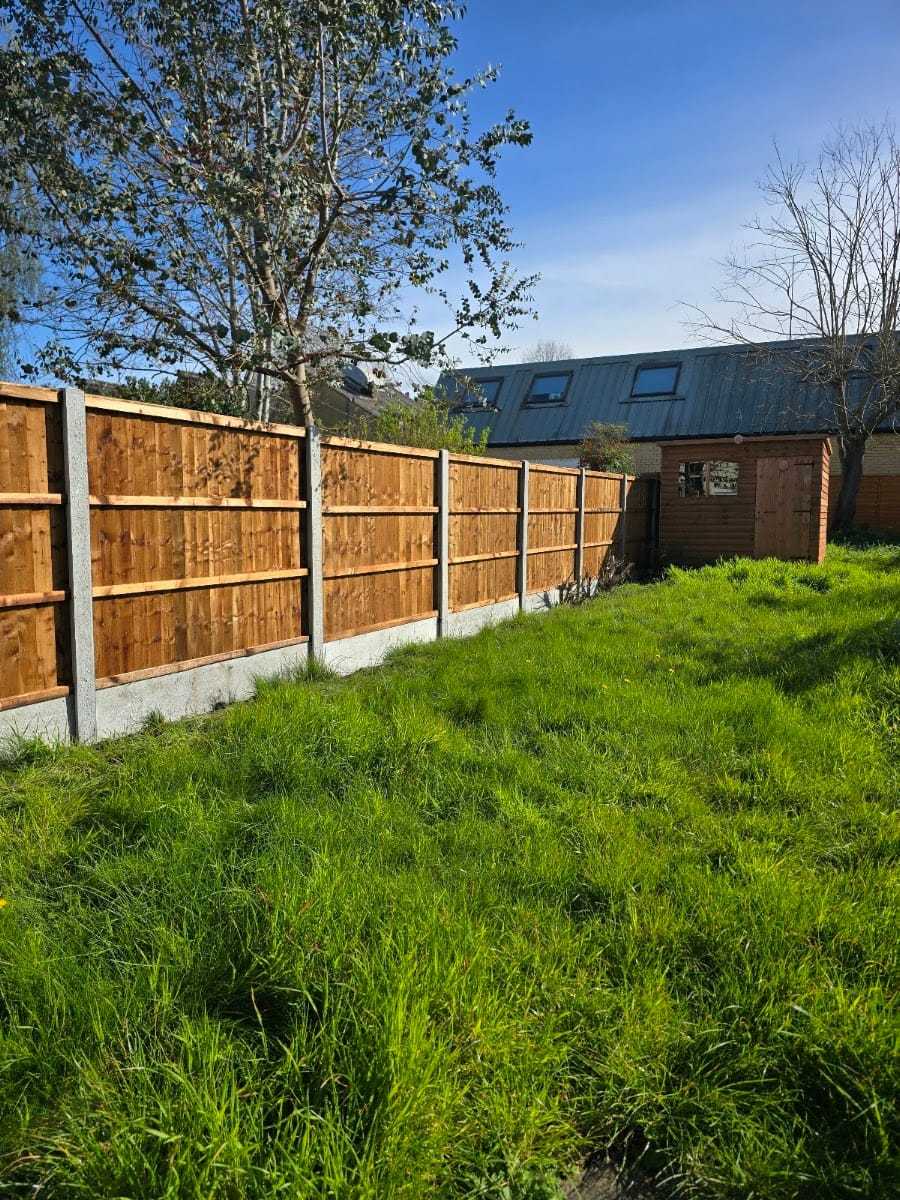 Closeboard fence on concrete posts, by Fencefix